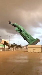 6.3M views · 2.9K reactions | Statue falls over from giant windstorm A replica of the Statue of Liberty gets blown over from a freak windstorm. his video and story are for entertainment purposes only and was created with A.I. | Mike's Mayhem | Facebook