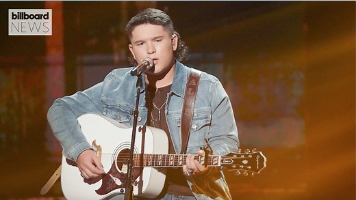 Billboard News: Top five American Idol finalist Caleb Kennedy is leaving the show after a video surfaced of him sitting next to a friend in what looked like a Ku Klux Klan hood. | Billboard
