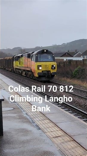 70 812 has no problem climbing Langho Bank in the rain with Carlisle North Yard to Chirk log train