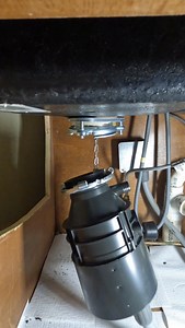 Easiest way to install a garbage disposal 🏗️ I’ve had this garbage disposal tool for almost 5 years now. It holds the flange down while you lock it in, no second set of hands, no strain, no wrestling under the sink. Works well with heavier units or if you’re nursing a shoulder injury and have to keep on working #diy #asmr #fyp #reels #homerepair #plumbingrepair #foryou #plomero #handyman | The Plumberlorian