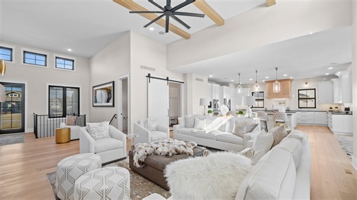 Walk onto Otter Creek Golf Course from this fully furnished $1.6 million home in Ankeny