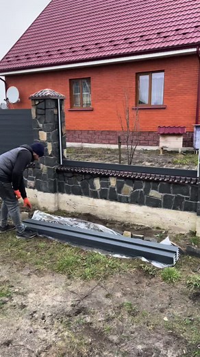 Installing a Metal Fence Panel in a Residential Area
