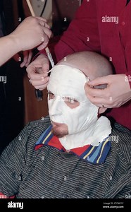 Milan Italy 1997-02-01: Articolo 31,J-Ax and DJ Jad, during the makeup for the masks used in the "2030" Music Video Stock Photo - Alamy