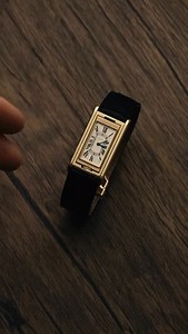 Vintage beauty. The Cartier Tank ’Basculante’ in 18ct yellow gold, made in 1960. A subtle twist on elegance, with a reversible case designed to conceal the crystal. All credit: @somlo_london | DailyWatch