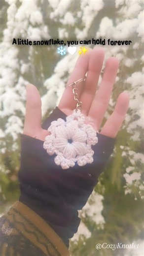 CozyKnotlet | Crochet & Handmade on Instagram: "When winter arrives, little handmade snowflakes follow ❄️✨ A cozy crochet snowflake keychain, made for cold days and warm hearts 💕 ✨ 💌DM to order yours 🤍 Customisation Available #crocheting #smallbusiness #snowflakes #fypage #snowfall [handmade snowflake keychain, crochet winter charm, cozy winter aesthetic, handmade gift ideas , small business crochet, snowflake, snowflake, crochet, growth, handmade, yarnlove ]"