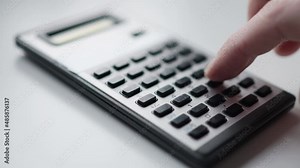 Old Retro Calculator Being Used to Calculate Closeup on Vintage Tech