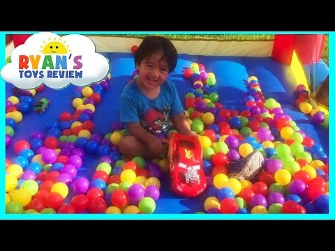 Ryan plays on Little Tikes Bounce House with Ball Pits Balls!