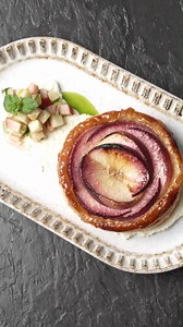 Chef Cesar Figueroa makes a beautiful Peach Danish featuring Family Tree Farms White Peaches, hojicha cream cheese, fig leaf whipped cream, fig leaf oil, and mint. #sponsored by Family Tree Farms #chefsroll #rollwithus #crfeaturesfamilytreefarms | Chef's Roll