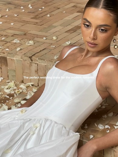 Meet Protea by @alenaleenabridal. The basque corset cinches at the waist, creating that coveted hourglass shape that's so in right now. With its soft square neckline, this gown brings a fresh, modern vibe to traditional elegance. Plus, our heavily boned corset with seamless straps ensures you'll be comfy and supported all day long. #weddingdress #dublinweddings #bride #ballgown #satinweddingdress