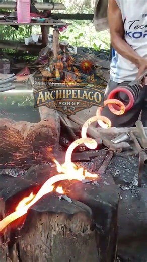 Manual Straightening of Coil Springs #blacksmith #forging