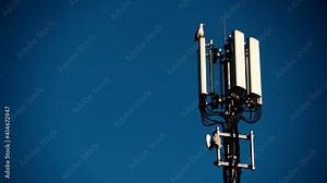 Mobile telephone radio network antenna 4G or 5G on telecommunication mast against sky. New technology generation. Radiation, human health issues.