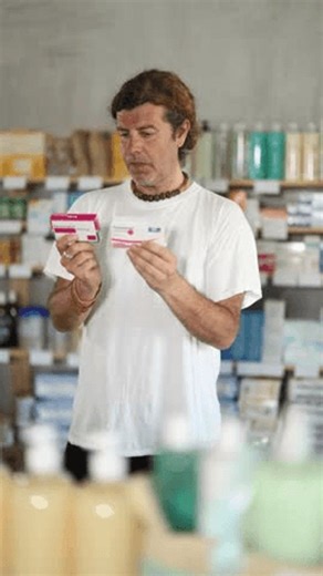 clip-4029636025-adult-man-buyer-chooses-box-paracetamol-tablets