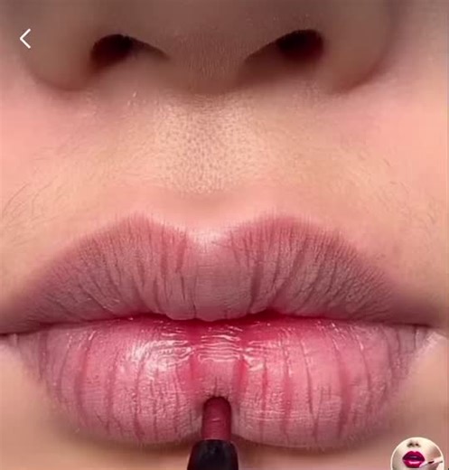 Applying Vibrant Red Lipstick: A Close-Up Tutorial
