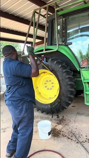 This how you break a tractor tire down with a bead breaker.