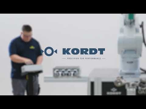 Full-automatic thread testing unit TRANSICORD 10500 on robot with exchange station for gauges