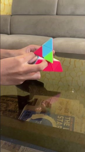 Solving the pyraminx Rubik's Cube.