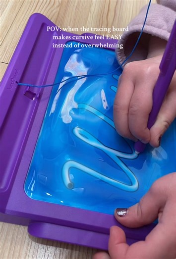 This cursive tracing board is perfect for littles working on fine motor skills and writing practice! #cursive #cursivewriting #writingpractice #finemotorskills #homeschool