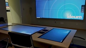 The ultimate conference room with a table that includes three embedded multitouch displays and Crestron controls. The sources from the table can be switched to display on the LG 3 x 3 video wall. https://ideum.com/news/ultimate-conference-room-touch-table This dream table is what we were asked to design and build for Amada, a Japanese manufacturer of metal processing equipment. In fact, we’ve just built and installed four of them along with large video walls for their showroom just outside of Ch