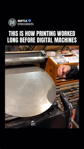 Nurtle on Instagram: "This is a letterpress printing machine, a mechanical printing system that dominated commercial print for decades before offset and digital methods took over. Letterpress works using relief printing, meaning ink is applied to raised type or plates and then pressed directly onto paper. The rotating ink disk spreads ink evenly, while the rollers carry it to the type before pressure transfers the design. This process creates a slight physical impression in the paper, something 