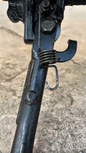 Installing springs on the suspension mechanism of a vehicle, usually a motorcycle or bicycle #shorts