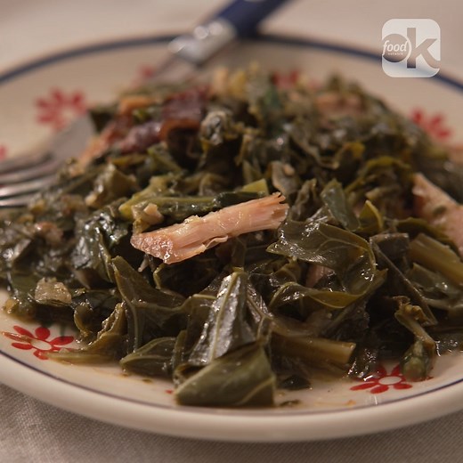 Roasted garlic and a smoked turkey leg infuse these collard greens with SO much flavor! 🤤 Get Kardea Brown's recipe: https://foodtv.com/3aWC8s0 | Food Network Kitchen