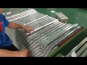 Automatic gift wrap paper self-adhesive film roll winding and shrink wrapping machine
