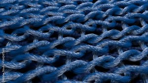 An original 3d rendering of folk knitted material strands with oval knots linked with each other.The blue strands are placed on the black background. The tissue moves in a wavy way.