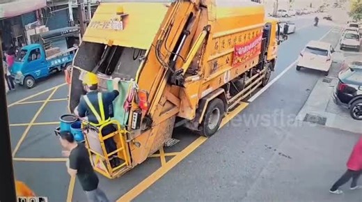 Bag of rubbish explodes as dustbin man throw it into truck