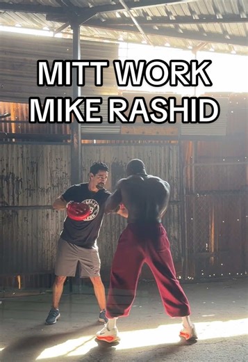 On the mitts with Mike Rashid.