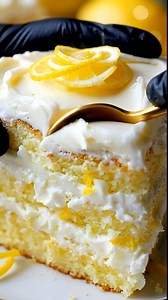 Lemon Velvet Cake with Lemon Cream Cheese Frosting: A slice of pure sunshine! 🍋✨ This cake lives up to its "velvet" name with an incredibly soft, tender crumb that melts in your mouth. Infused with fresh lemon zest and juice, and covered in a tangy, rich lemon cream cheese frosting, it’s the perfect balance of sweet and citrusy. #LemonVelvetCake #LemonCake #CreamCheeseFrosting #CitrusBaking #SpringDessert #MoistCake #LemonDessert #LayerCake #BakingFromScratch #SummerBaking #VelvetCake #ComfortF