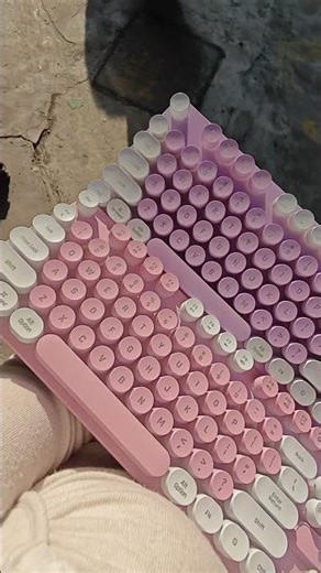 The striking pink and purple hues on the keyboard #keyboard #gaming #computer #pink #mouse
