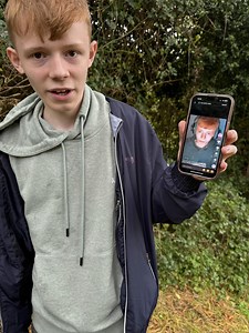 Buffer Video kid holding up the Buffer Video on TikTok