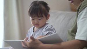Parents Children Reading Picture Books Stock Footage Video (100% Royalty-free) 1079324354 | Shutterstock