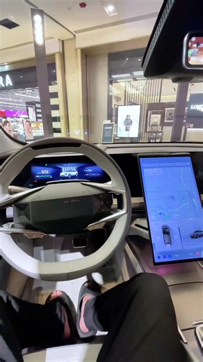 Futuristic Car with Mecha-Style Design and Massive Screen