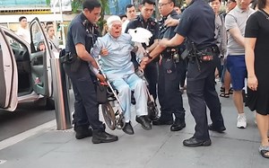 Parrot Man caught on camera loudly resisting arrest for disorderly behavior along Orchard Road | Coconuts