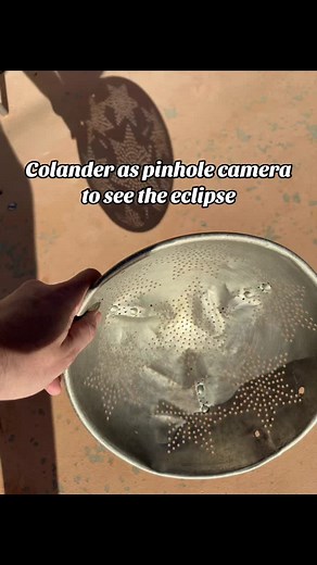 Colander as pinhole camera to see today’s eclipse