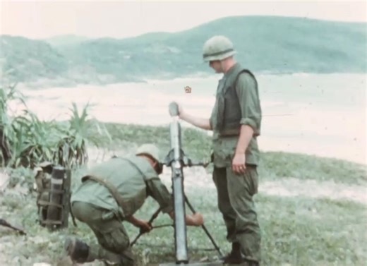 Marines drop round from the M29 81mm mortar — the deep thump echoing through the hills. Fast hands, calm voices, controlled chaos. The sound of steel and discipline. #GhostsoftheBattlefield #USMC #VietnamWar #MortarCrew #M29 #MarineCorps #FireMission #CombatHistory #MilitaryHeritage #HistoryMatters | Ghosts of the Battlefield