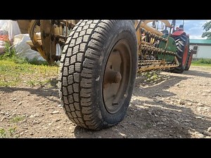 Replacing tires on a hay rake