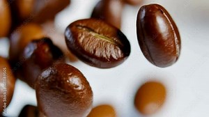 Extremely slow motion of coffee beans flying Stock Video