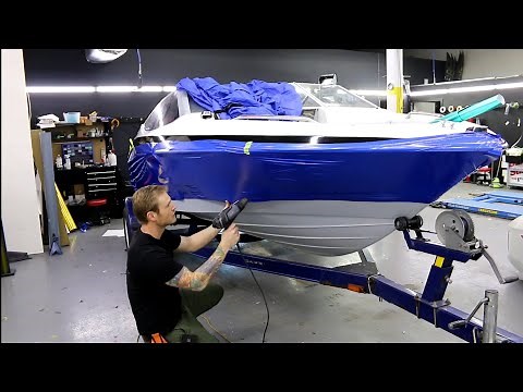 Vinyl Wrap A Boat In Gloss Black And Diamond Blue