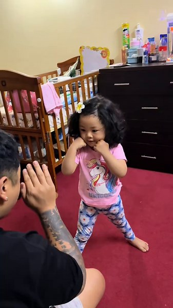 Engaging Daddy-Daughter Boxing Session