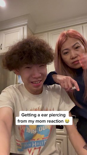 Ear Piercing Reaction: Mom's Professional Touch