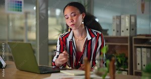 Administration, woman and writing on diary at office with laptop at work for deadline, project and motivation to meet target. Notebook, calendar and planning for meeting, research and proposal.