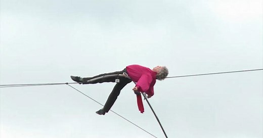 Tightrope walker crosses River Seine