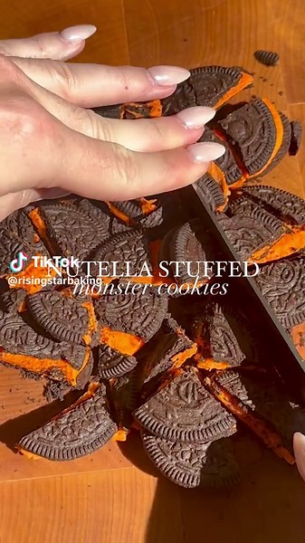 Warning: these cookies are SCARY good 🍪👻 ⁠ ⁠ Nutella Stuffed Monster Cookies Recipe:⁠ ⁠ Ingredients:⁠ 1 cup AP flour (135g)⁠ 1/4 cup Rising Star Cocoa Powder (28g)⁠ 1/2 tsp baking powder⁠ 3/4 tsp salt ⁠ 3/4 cup brown sugar (165g)⁠ 1/4 cup granulated sugar (50g)⁠ 1/2 cup (1 stick) salted butter, softened ⁠ 1 egg, room temperature⁠ 1 tsp Rising Star Organic Vanilla Bean Paste⁠ 1 1/4 cup chopped Halloween Oreos⁠ Eyeball candies ⁠ Nutella, scooped into 12 1/2 tbs blobs and frozen ⁠ ⁠ Instructions: