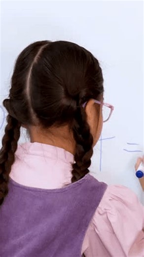 clip-4031258087-young-student-writes-math-equations-on-whiteboard