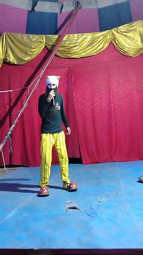 Engaging Stage Performance with Unique Attire