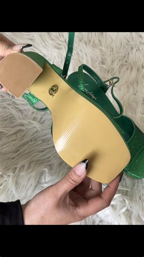 . Upper: Glitter-coated PU leather (that shiny green surface) . Front panel: Synthetic mesh/net fabric with glitter finish ( for breathe ability sparkle) . Sole: Rubber or synthetic sole It’s a man made fashion heel . #fyp#heels#online#nepal#foryou