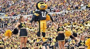 Iowa Hawkeyes Cheerleader Had Unfortunate Wardrobe Malfunction Performing Airials In End Zone (VIDEO)