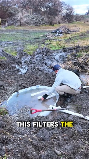》Stefano Creatini《 on Instagram: "Here is the exact process for developing a spring box to move water without pumps. Step 1: Excavate the "eye" of the spring down to clean flow. Step 2: Install the collection box. I used a cut-down IBC tote with perforated PVC inserts. Step 3: Backfill with clean rock to filter sediment before it enters the line. Result: We hit a flow rate of 20 gallons per minute. This volume can now be piped gravity-fed to the driest part of the property. #permaculture #homest
